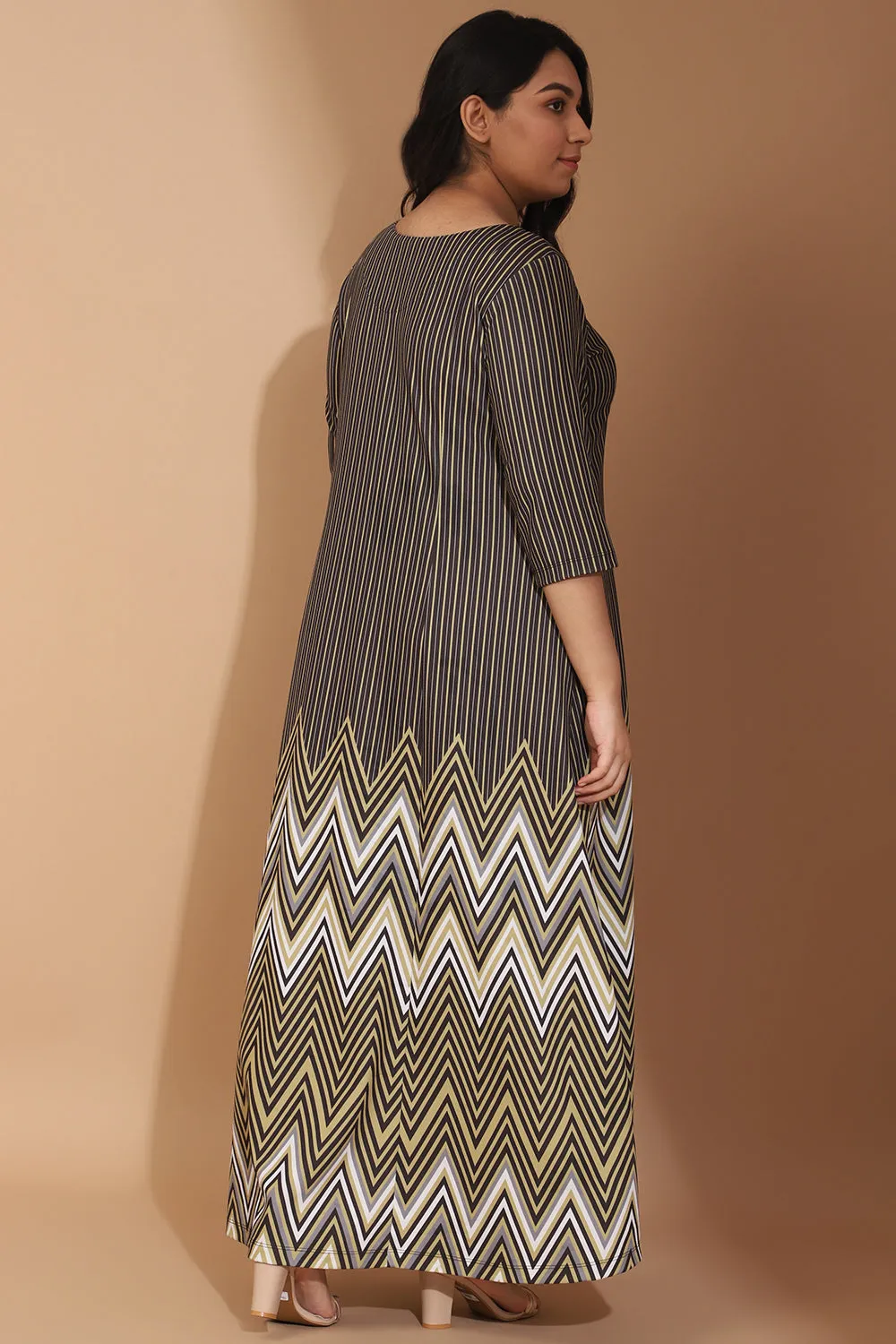 Sure! Here’s an optimized title for the product:

Elegant Green Chevron Melody Printed Maxi Dress for Effortless Style